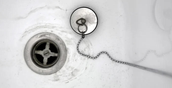 How to Fix a Slow Draining or Clogged Kitchen Sink – 2024 Guide