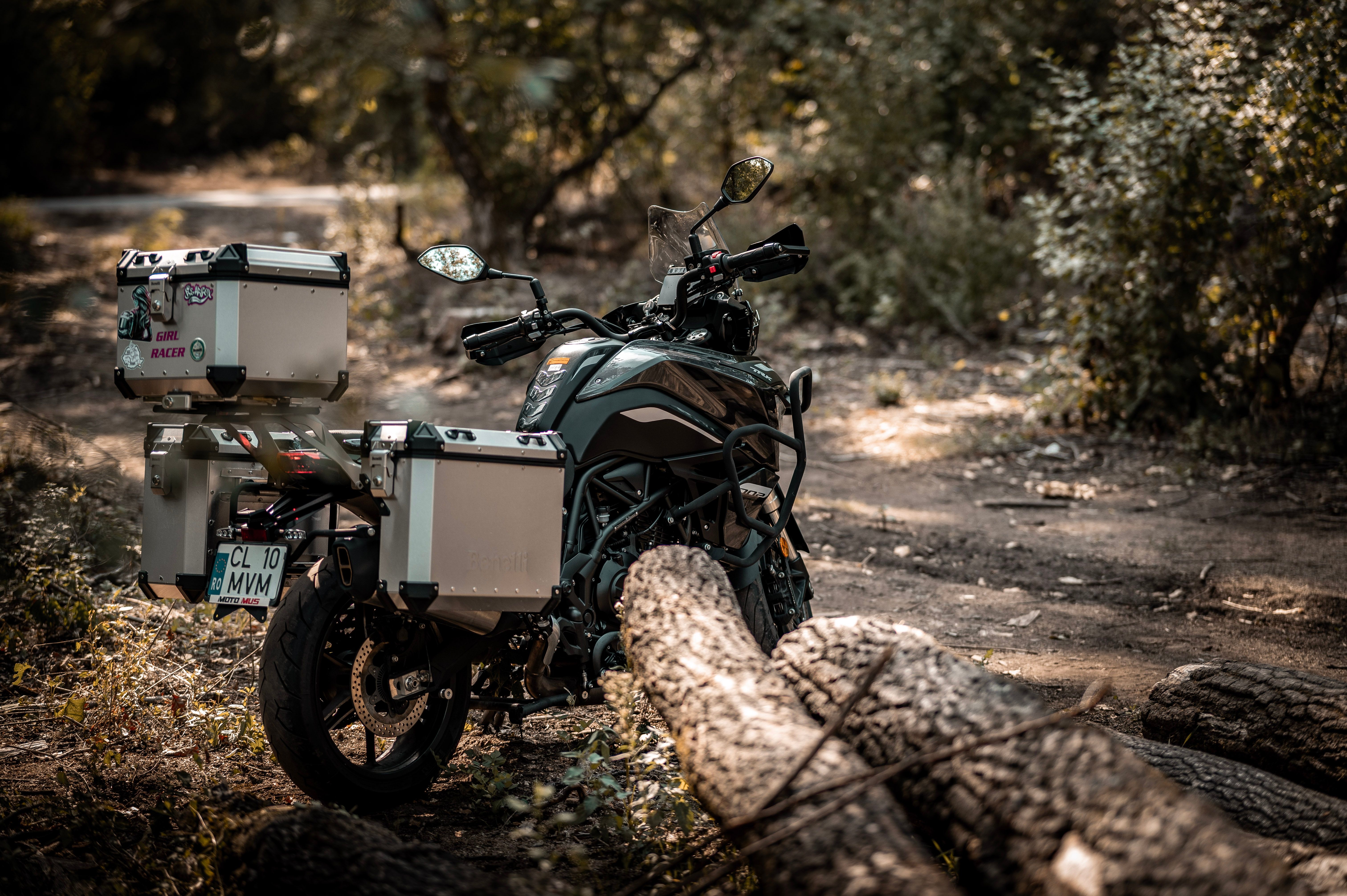 Touring motorcycle fitted with waterproof luggage boxes and panniers for long trips